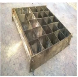 Figure 1. 100 mm x 100 mm cast tray used in producing the test cubes. 