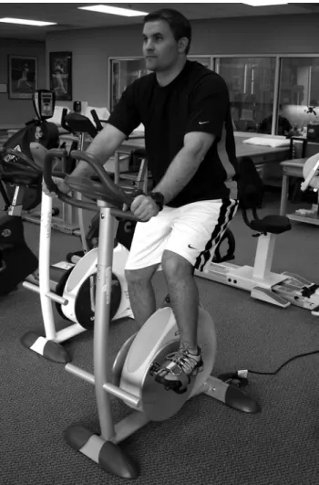 FIGURE 2. Bicycle riding on a Unicam machine (Unicam Corpora- Corpora-tion, Ramsey, NJ) that can adjust the pedal axis to alter the range of motion performed.