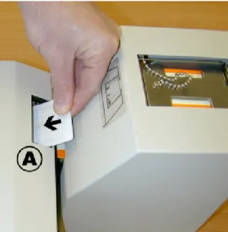 Figure 7.  Inserting a cleaning card in rear ticket entry 