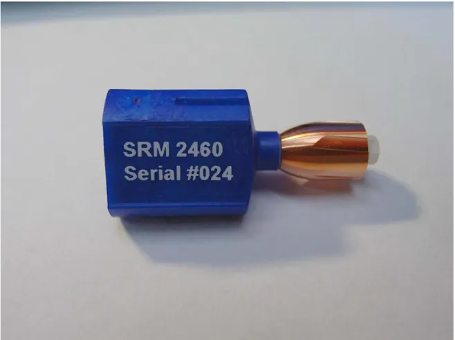 Figure 1.  A NIST SRM 2460 standard bullet is mounted on a blue stub.  One of the six  highly uniform, land engraved areas (trapezoidal in shape) is clearly visible