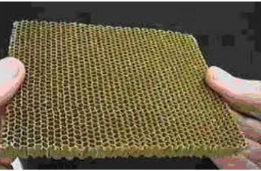 Fig. 2. An auxetic material increases in thickness under tension.
