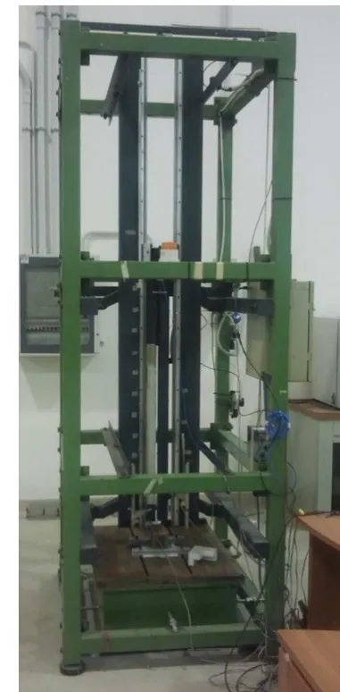Fig. 1. Photo of the instrumented drop-weight machine.  