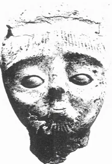 Figure 1.1: Limeplaster sculpture, found in Jericho, about 7,000 B.C. [127].