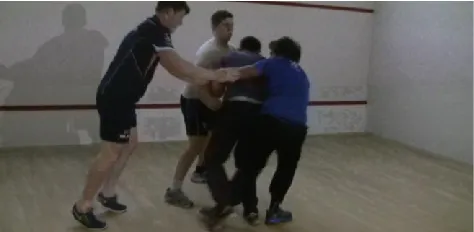 Figure 1. Attackers try to keep the 'it' player still in Bundle. 