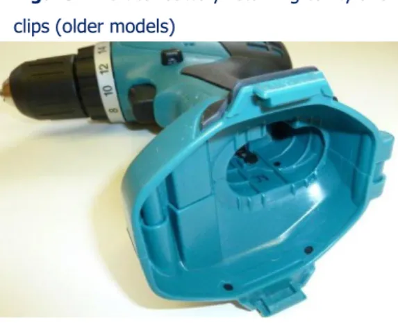 Figure 1 Vertical battery retaining cavity and  clips (older models) 