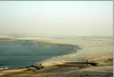 Figure 1.2 – View of the Indus River looking downstream from Kotri barrage.  Instead of flowing water there are only pools and sand dunes