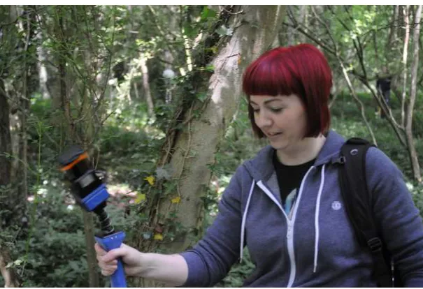 Figure 1. ZEB1 handheld mobile laser scanner in operation for forest mapping. 