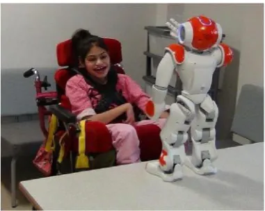 Fig. 2. A pupil working with the robot 