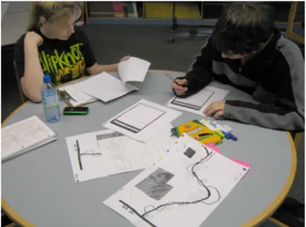 Figure 6: Students designing a mock-up of the final AR simulation. 