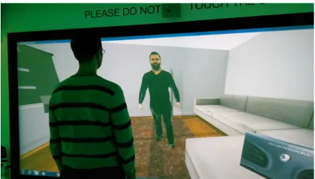 Figure 2. The client in the foreground is approached by a threatening other. The threat is a pre-recorded 3D reconstruction of someone approaching aggressively