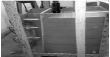 Figure 1: Cellular Reinforced Wall In Model Test Tank 