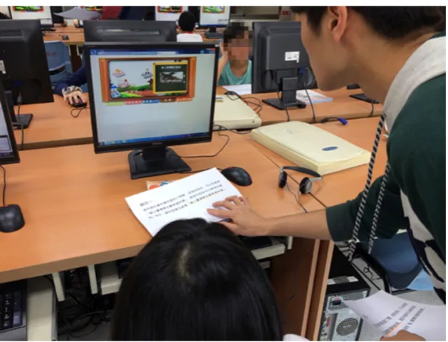 Figure 7.  Children operating the graphical interface during the experiment 