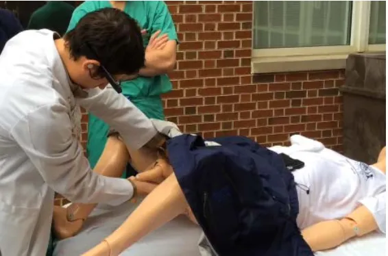 Figure 2: Live-feedback between mock-trainee and remote instructor (not shown) in a vaginal breech 