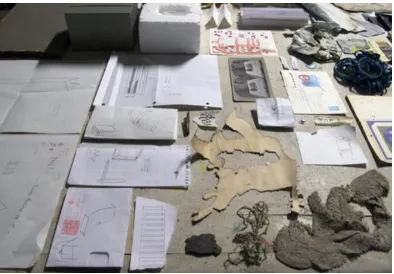 table included such items as sketches, found objects and materials that had been 
