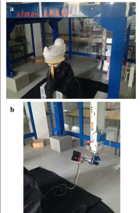 Fig. 9 a, b AFMA robot’s effector mounted with SR-4K camera andfocussed on the object
