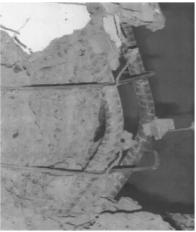 Fig. 4 Typicalbucklingoflongitudinalbarinaspiral-reinforced column.