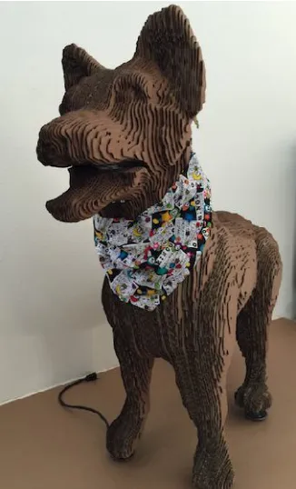 figure.  The manufactured animatronic dog figure is capable of jaw, neck, and tail movement and the jaw movement is synchronized with the sound source
