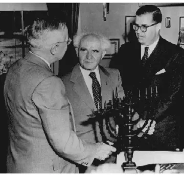 Figure 1.4. President Harry S. Truman meeting with Prime Minister David Ben-Gurion of Israel and Israeli Ambassador Abba Eban on May 8, 1951.43  President Truman is receiving a gift of a menorah