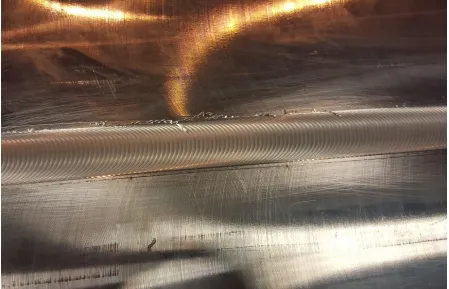 Figure 3.1.5: Completed Weld with Scroll Lines Still Present 
