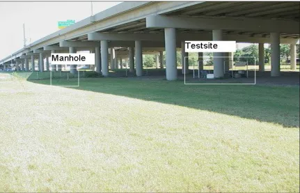 Figure 2:  View of the Experimental Site and Manhole. 