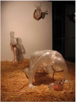 Figure 5.      Conduit, 2008, packing tape, straw, extension cord, light, wood plaque, dimensions variable 