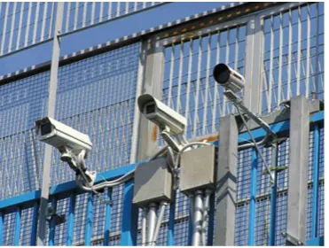 Fig. 2 Reference system: video cameras watching vehicles leavingthe test site