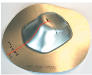 Fig. 11.  The end-cap drawn to 47 mm with the thickness distribution measurement line