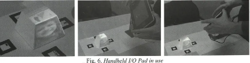 Fig. 6. Handheld I/O Pad in use