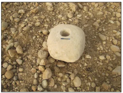 Fig 6. Stone mortar recovered  from the site of Maroon 1.