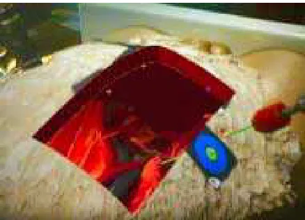 Figure 2: The MIT Tangible Media Groups' “Illuminating Clay” TUI. 