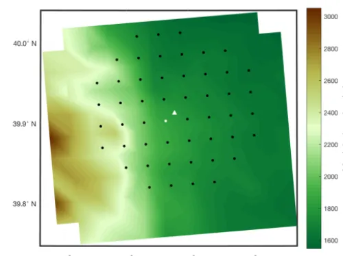 Figure 1. Model elevation (color contour) surrounding the M5tower (white triangle). The 50 closest model grid points (dots) areoverlaid