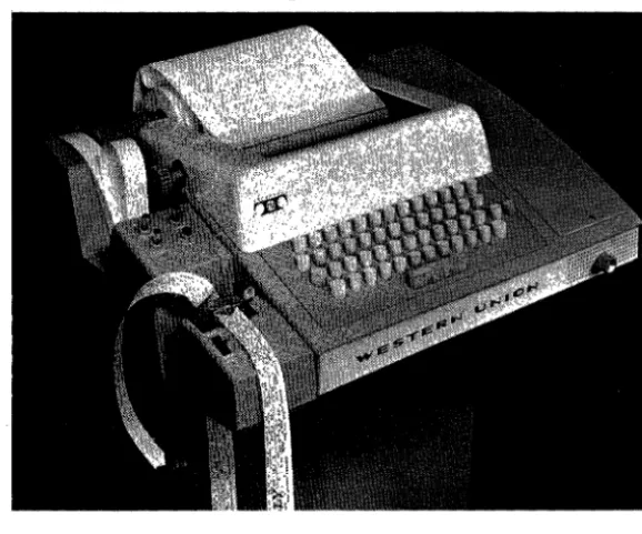 FIGURE 1-3. The ASR-33 from Teletype Corp. Once the standard terminal for small computers, this slow, noisy mechanical device has left a legacy in the device type designations still found in the CP/M operating system