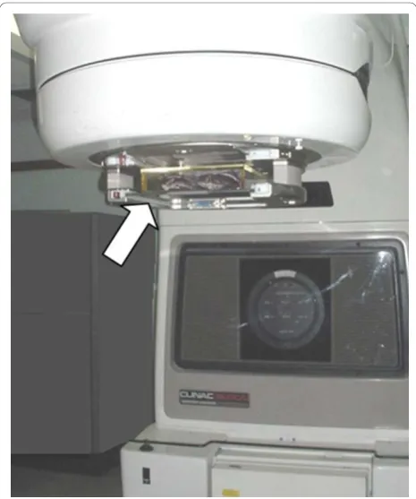 Figure 2 Box fixed at the head of the LINAC (see arrow).