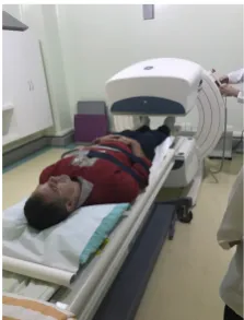 Figure 5. Patient performing Lymphos-cintigraphy examination. 