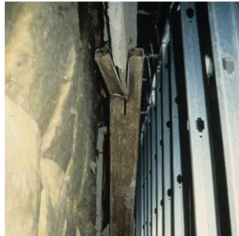 Figure 5-8: Apartment building with damaged  structural members that is globally stable