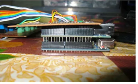 Figure 7 (a) and (b) The hardware implementation of the relay control module  