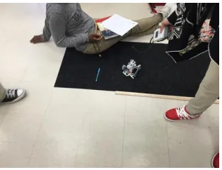 Figure 6.  Students in Close of Proximity to the Robot During Testing 