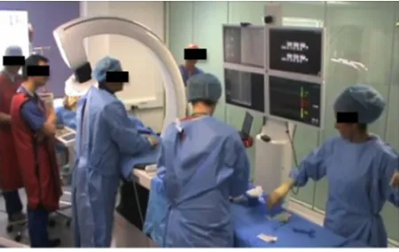 Figure 3 Team training in a fully immersive hybrid angiosuite simulator.