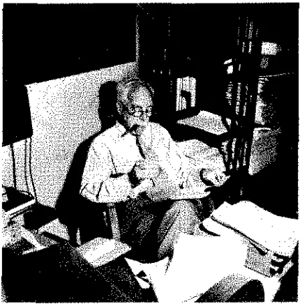 Figure 8. Gilben Newton Lewis at work in his Gifman Had Office.