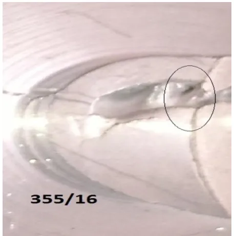 Fig. 2(f) showing hole defect and verticle line defect 