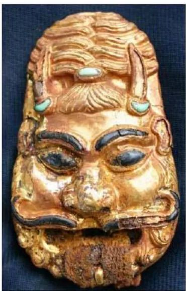 Fig. 7.5 Gilded iron monster mask buckle ornament with turquoise inlays (Minyaev and  Sakharovskaya 2007b: 53) 