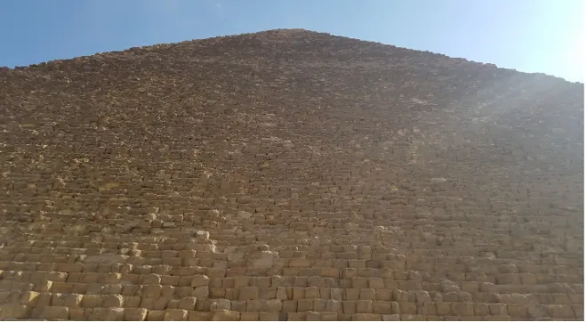Figure 2. View of the west wall of Khufu’s pyramid on a winter afternoon with the sun rays approximately parallel to the east and west base