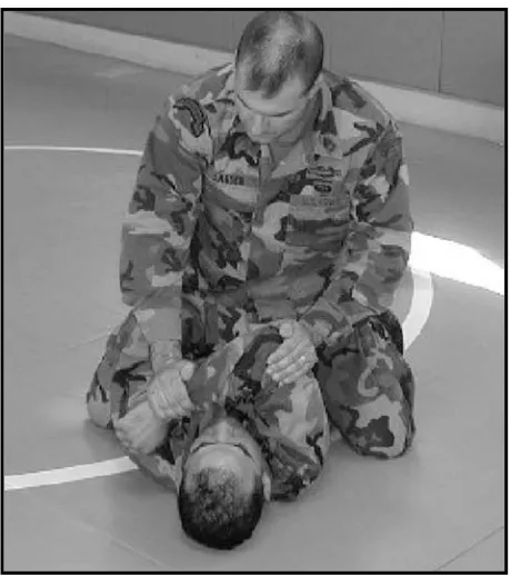 Figure 3-27. Arm push and roll to the rear mount, step 1.