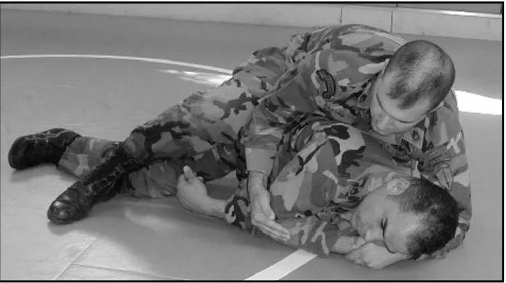 Figure 3-29. Arm push and roll to the rear mount, step 3.