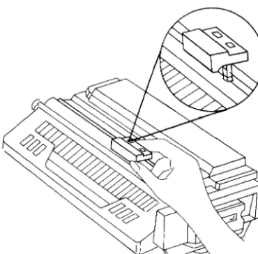 Figure 2: Cleaning the Primary Corona Wire 