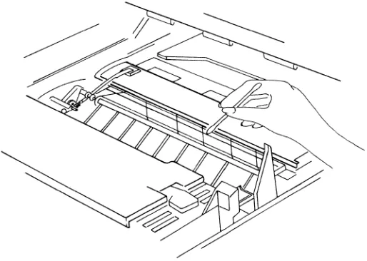 Figure 3: Cleaning the Transfer Corona Wire 