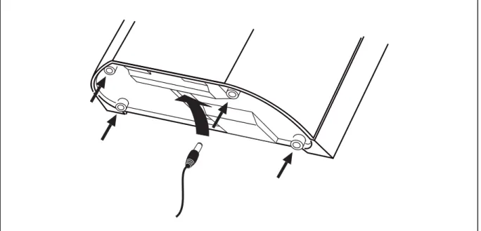 Fig. 3:  Bottom side of the recorder with rubber feet and mains cable socket 