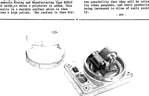 Figure 1 -- Small high-speed magnetic drum of Ferranti Electric; 24,000 binary digits, 2.5 milli-seconds access, 20 heads; also glass dust cover 