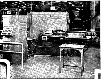 Figure 1. Numerical control punch press. Il\IP computer-assisted pro-gramming is adaptable to many makes of numerical-control punch presses