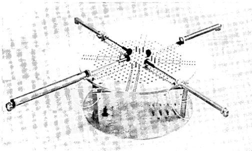 Fig. 6. Th tons holding rotate is computer-controlled turntable can a part into a known orientation